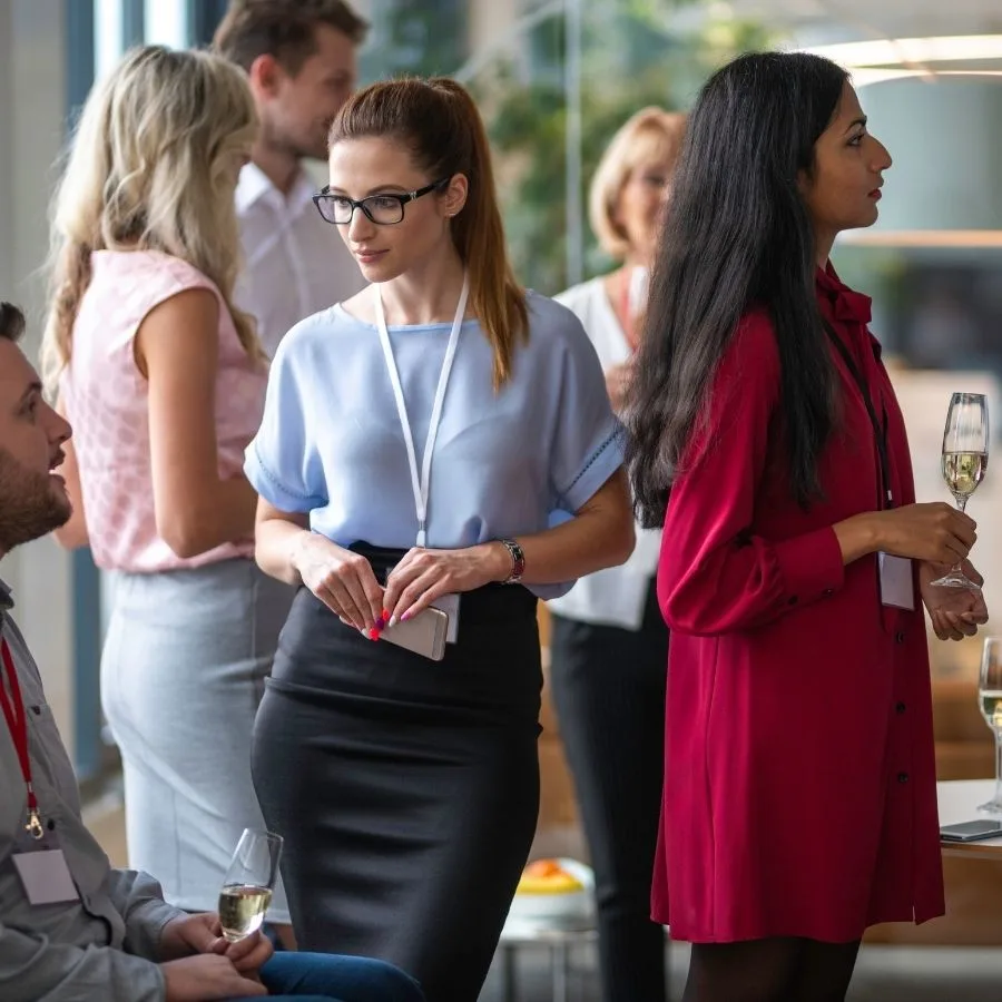 Professionals networking in a premium event setting