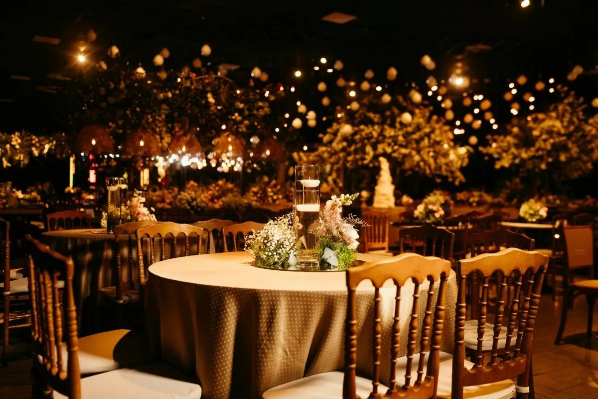 Elegant gala awards dinner setting with warm lighting and premium atmosphere